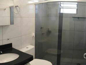 Shower, towels, soap, toilet paper