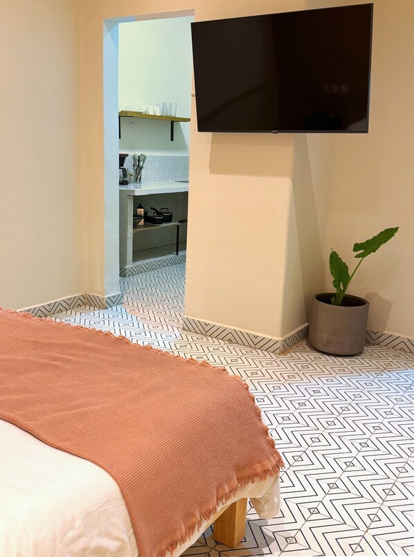 1 slaapkamer, een strijkplank/strijkijzer, wifi