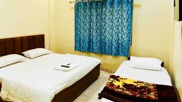 Kamar Triple Deluks | Ruang kerja ramah laptop dan Wi-Fi gratis