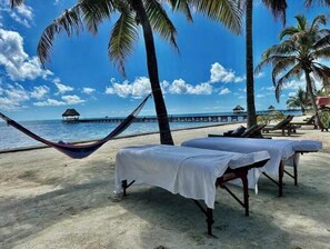 On the beach, sun loungers, beach towels