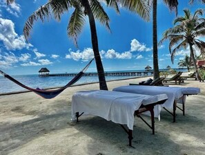 On the beach, sun-loungers, beach towels