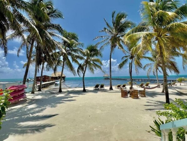 On the beach, sun-loungers, beach towels