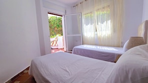 Apartamento família, sacada, vista para o jardim | Wi-Fi de cortesia