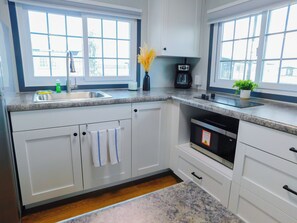 Fridge, microwave, coffee/tea maker, toaster