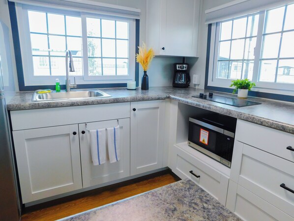 Fridge, microwave, coffee/tea maker, toaster