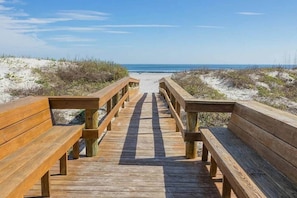 On the beach, sun loungers, beach towels