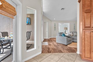 Smart TV, fireplace, books, offices