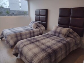 Family Apartment, City View | Room amenity