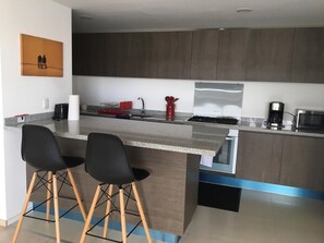 Family Apartment, City View | Room amenity