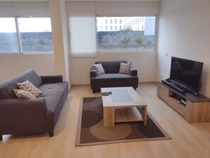 Family Apartment, City View | Room amenity