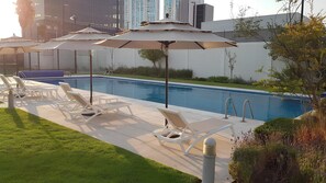 Outdoor pool, open 6:30 AM to 8:00 PM, pool umbrellas, sun loungers