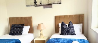 Stylish 3BR Home | Garden + Wi-Fi + Parking – Perfect for Work or Family