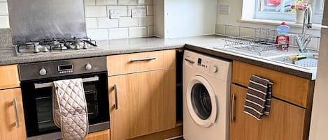 Een magnetron, een oven, een kookplaat