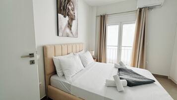 2 habitaciones, tabla de planchar con plancha, wifi y ropa de cama