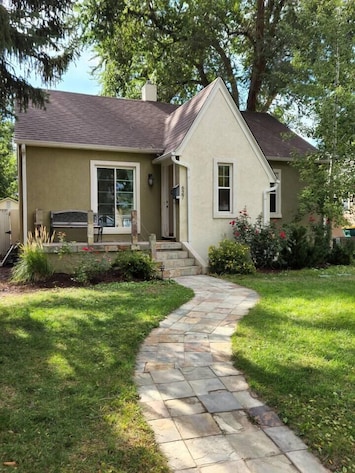 Outside of house also has a nice driveway for parking off the street in the front.