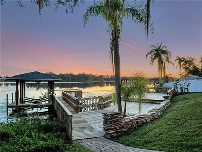 The American Dream House – Lakefront Luxury with 2 Heated Pools & Hot Tub
