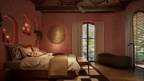 Villa de luna de miel, vista al jardín | Minibar, caja de seguridad en la habitación y escritorio 