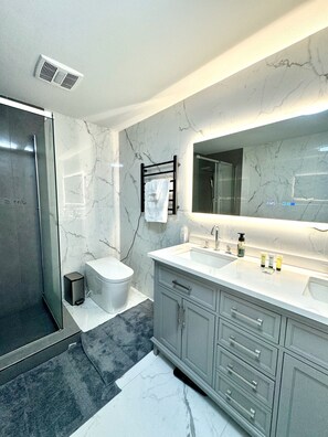 Shower, jetted tub, hair dryer, bidet