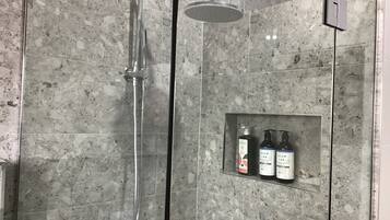 Hair dryer, towels, soap, shampoo