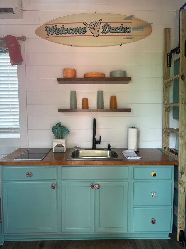 Fridge, microwave, stovetop, coffee/tea maker