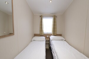 2 habitaciones y ropa de cama