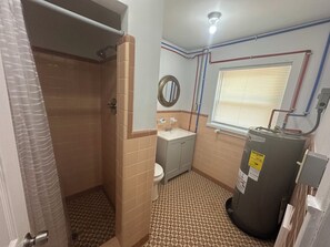 Shower, towels, soap, toilet paper