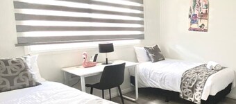 204 Stylish Twin BR w/ Fast WiFi - 18 mins tram to CBD