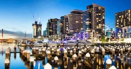 Stylish 2BR Condo | Docklands Waterfront Views| Free Access to Pool, Gym, Parking & Fast Wi-Fi