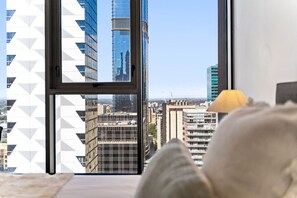 1 bedroom, desk, iron/ironing board, WiFi - Chic 1BR Apartment in Melbourne CBD | Stunning City Views, Pool, Sauna, Game Room, Near Chinatown & State Library (Melbourne)