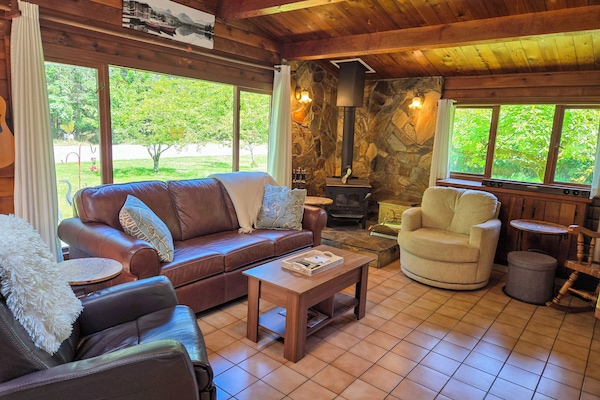 Seating: full-sized couch, recliner, swivel chair, and old fashioned rocker.