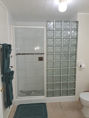 Shower, hair dryer, towels, soap