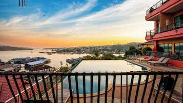 Double Deluxe Room Pool View | Balcony view
