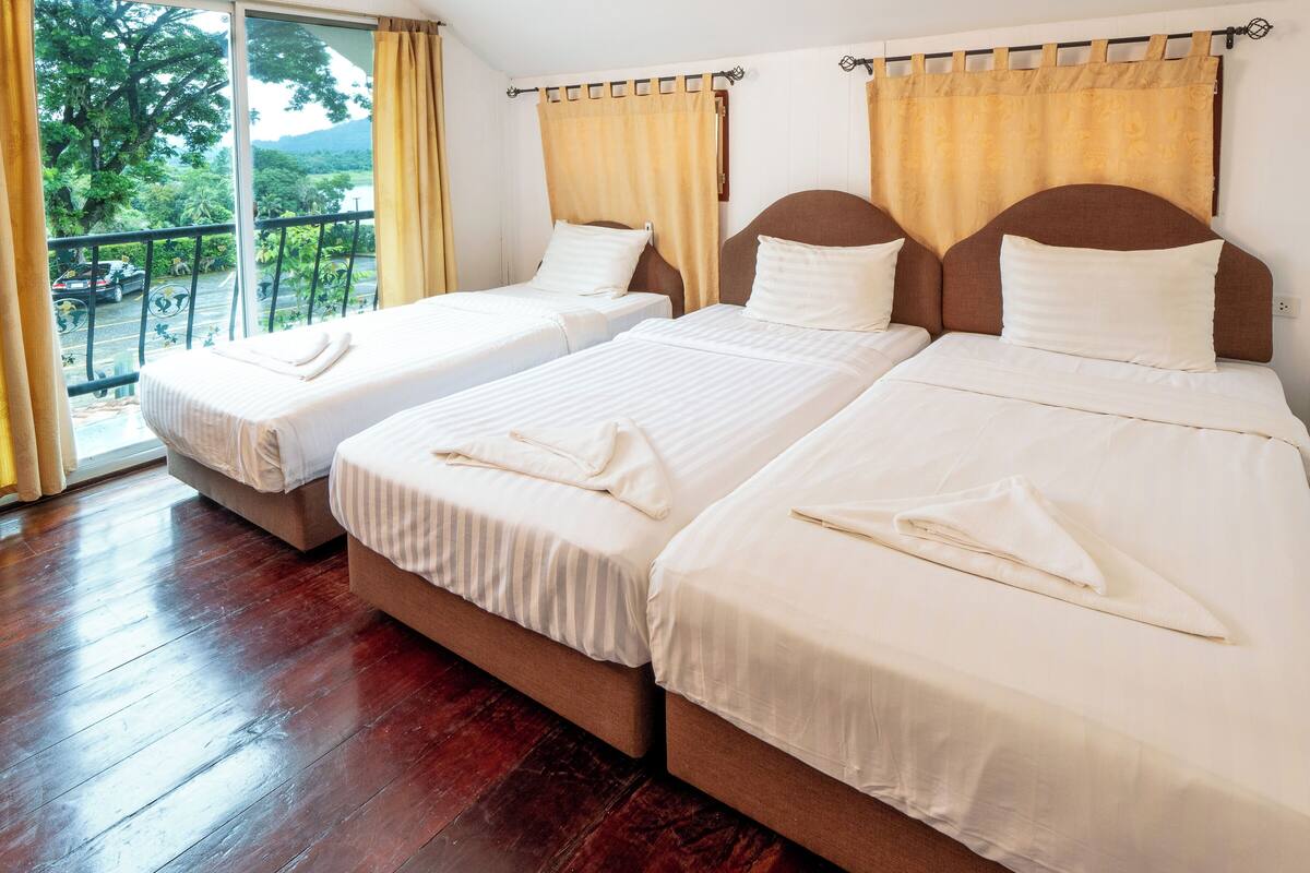 Blackout drapes, WiFi (free), bed sheets