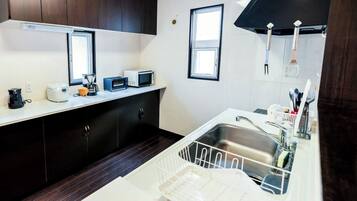 Fridge, microwave, stovetop, cookware/dishes/utensils