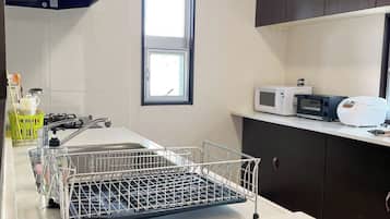 Fridge, microwave, stovetop, cookware/dishes/utensils