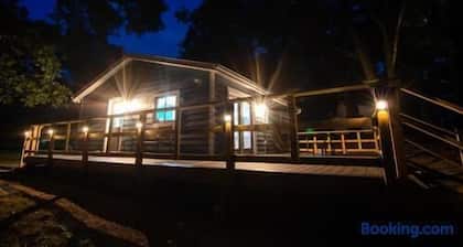 The Little Blue Cottage at School Section Lake