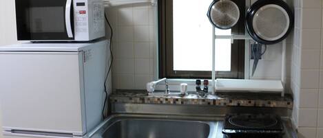 Fridge, microwave, stovetop, cookware/dishes/utensils