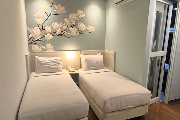 Desk, laptop workspace, free WiFi, bed sheets