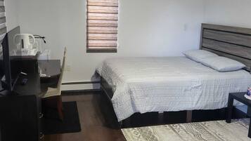 1 chambre, fer et planche Ă repasser, draps fournis