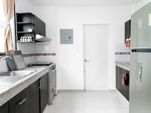 Microondas, horno, lavavajillas y tostadora