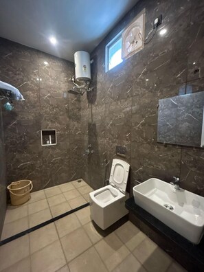 Shower, rainfall showerhead, towels, soap