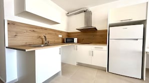 Fridge, microwave, coffee/tea maker, toaster