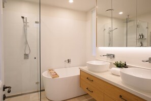 Shower, hair dryer, towels, soap