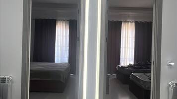 2 dormitorios, tabla de planchar con plancha, wifi y ropa de cama