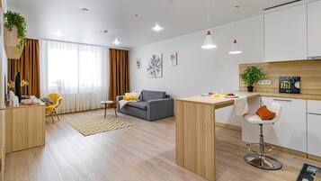 Apartment, 2 Bedrooms, City View | Living area | 40-cm Smart TV with cable channels