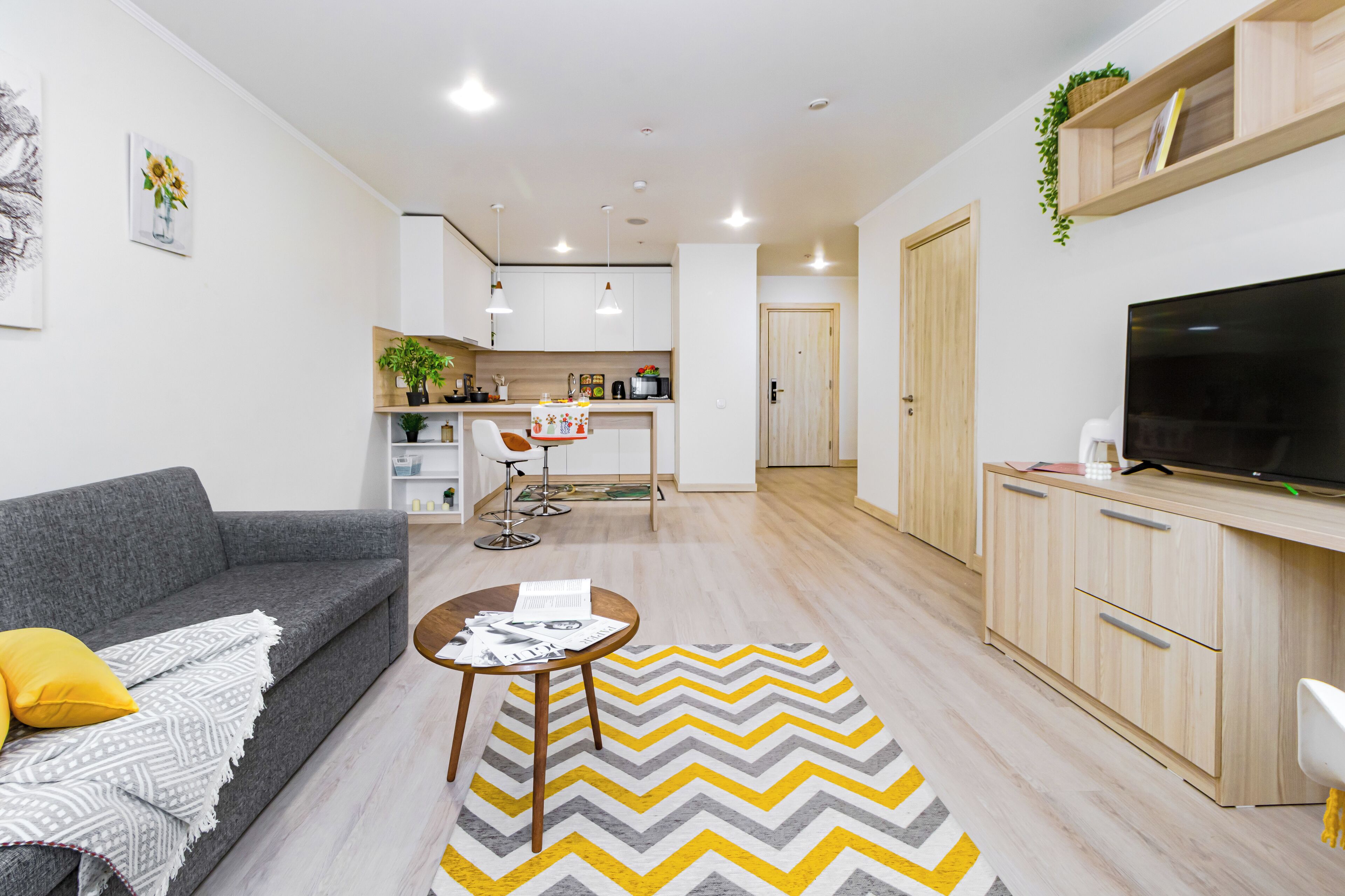 Apartamento, 2 quartos, vista para a cidade | Área de estar | Smart TV 40 cm com canais a cabo