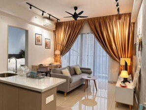 Superior Apartment, 1 Bedroom, Balcony, City View | Living area | 35-inch TV with cable channels
