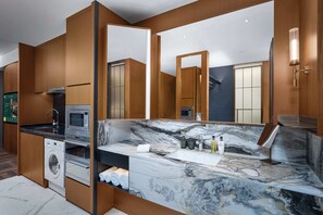 Free minibar, in-room safe, blackout curtains, soundproofing
