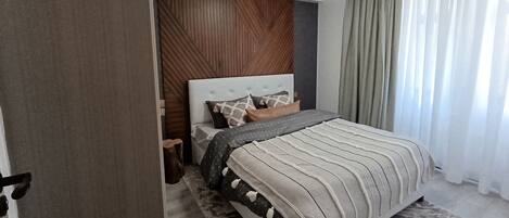 Comfort Apartment, City View | In-room safe, blackout drapes, iron/ironing board, free WiFi