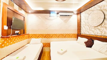 Quarto triplo luxo, vista para a cidade | Roupas de cama antialérgicas, escrivaninha, Wi-Fi de cortesia